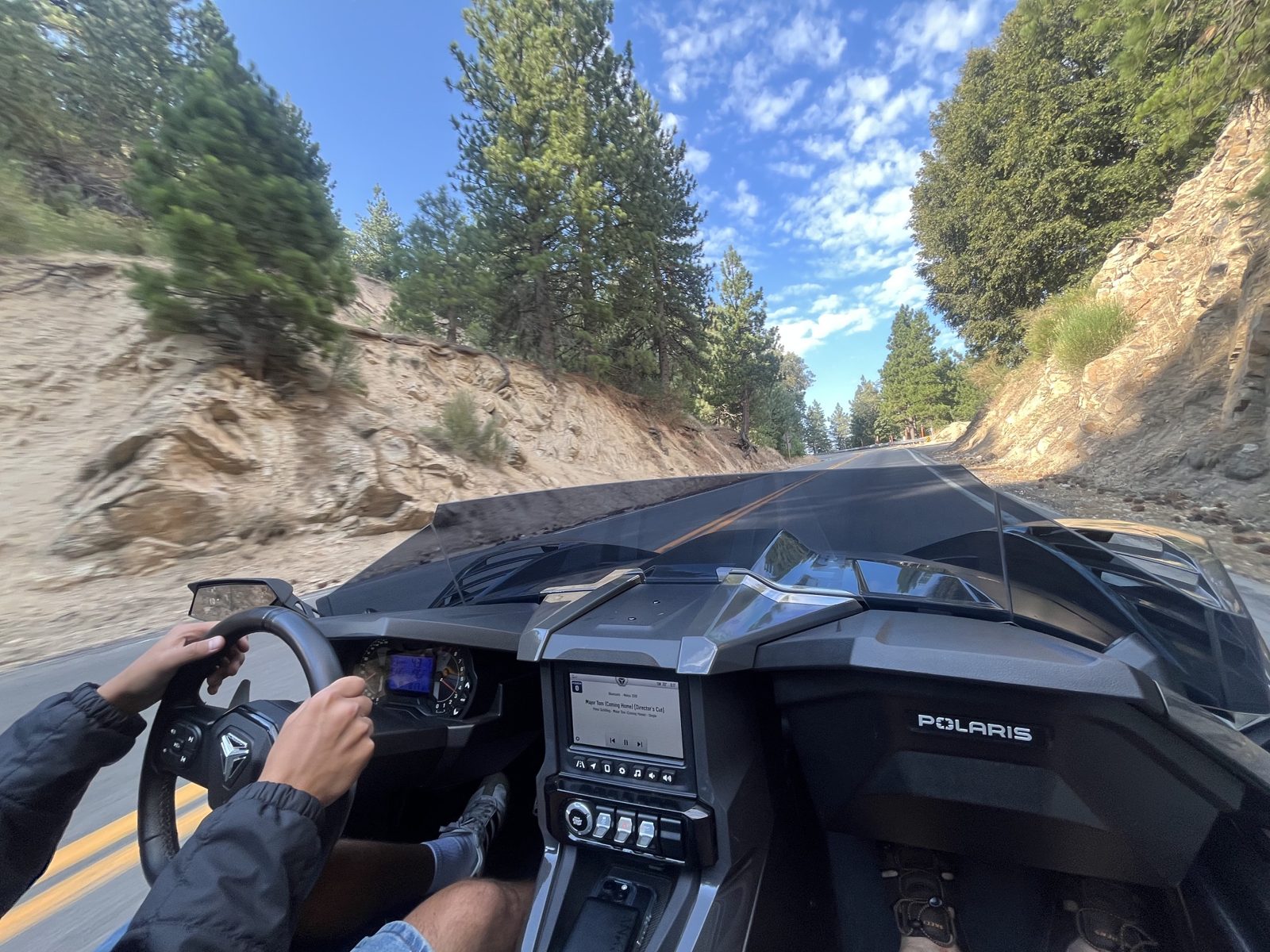 Through the canyon, hands on the wheel